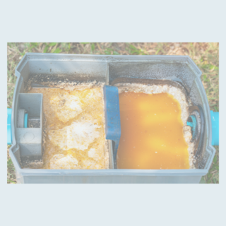 Cleaners for grease traps